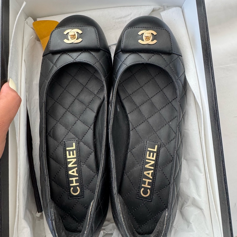 CHANEL Black Quilted Flats with Gold CC Logo 2025